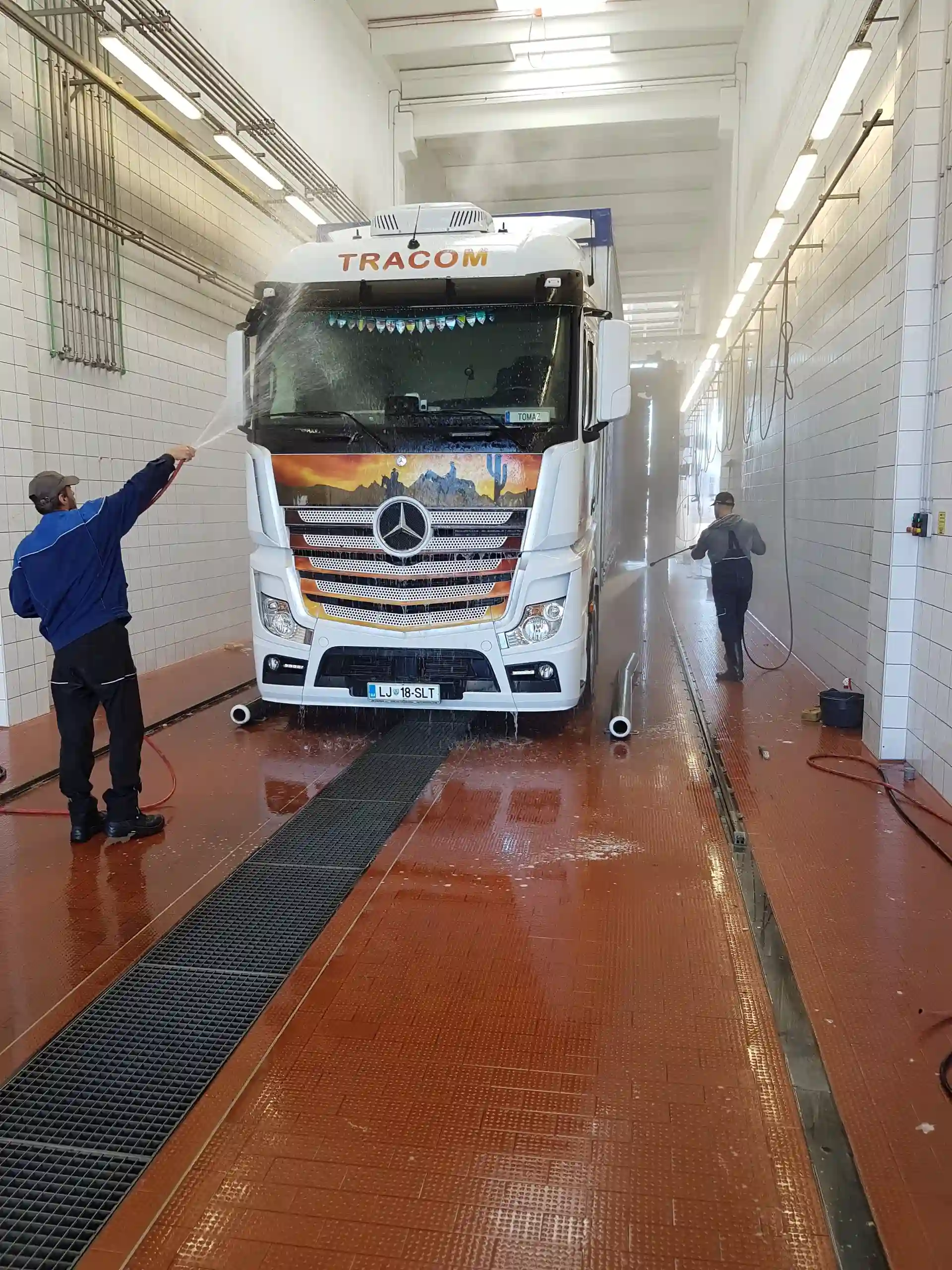 Tracom Actros being washed in the truck wash bay